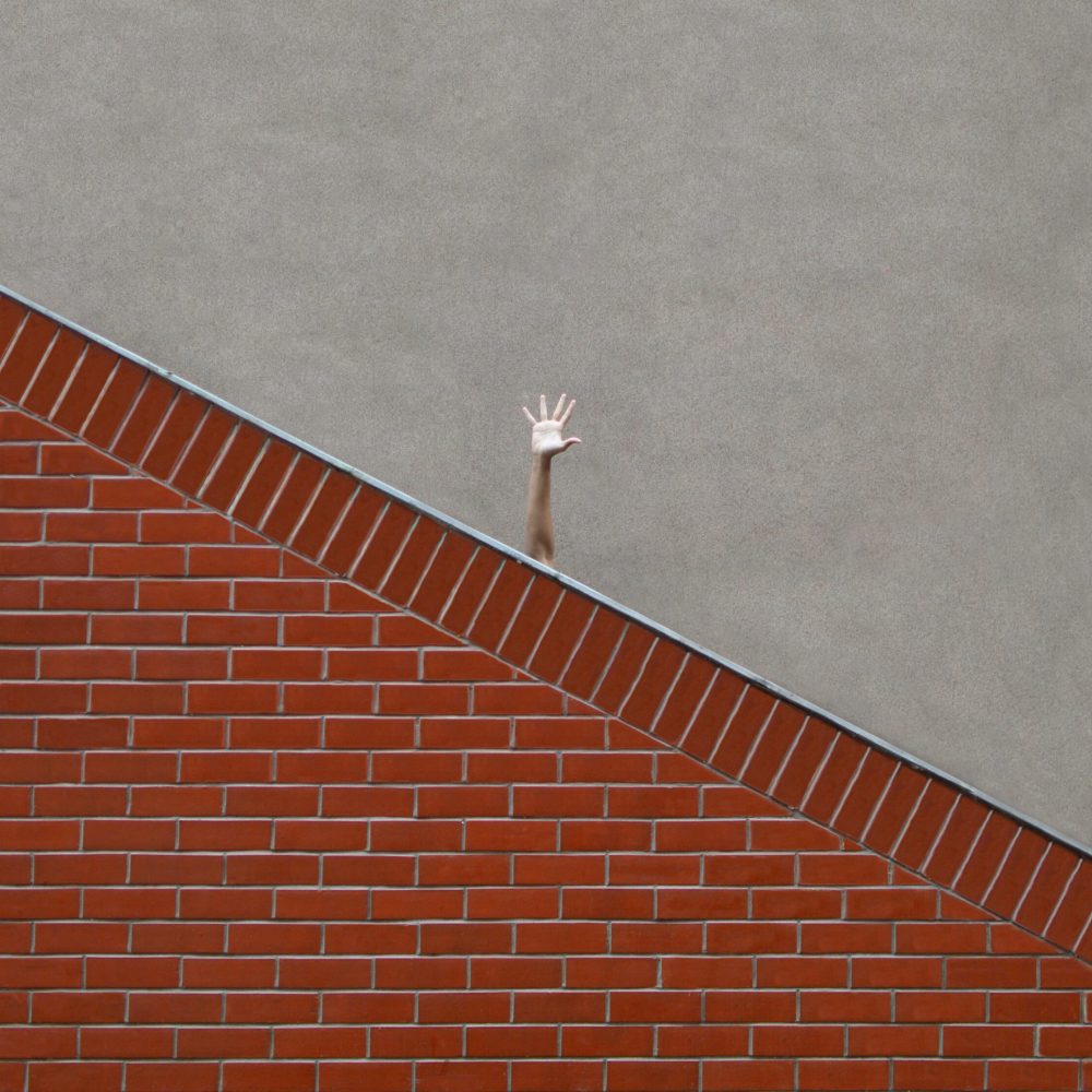 A hand reaching out near Lecture Hall 20_2018